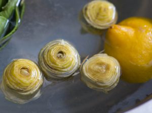 Trimmed Artichokes in Lemon Water