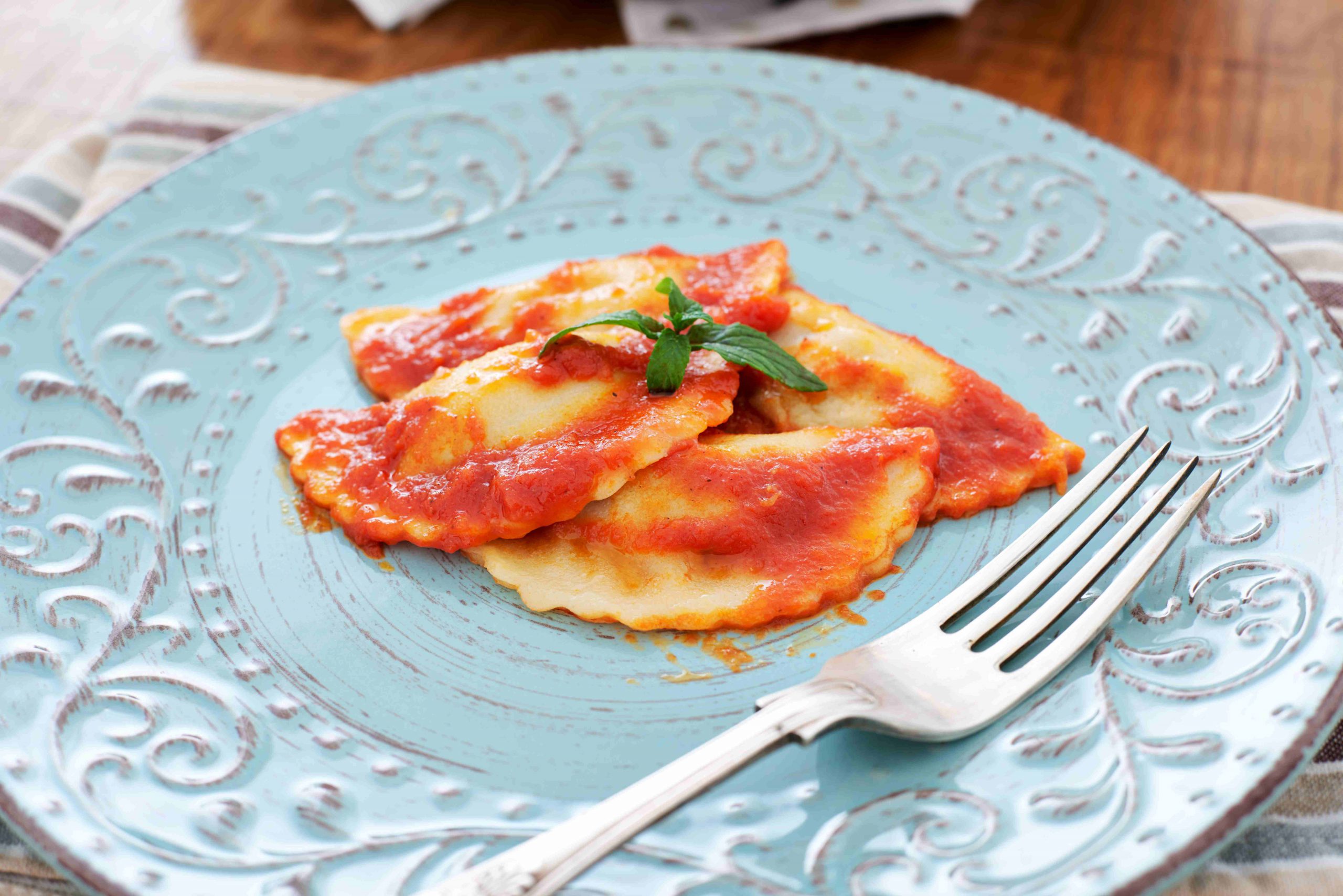 mezzaluna ravioli with five cheese marinara