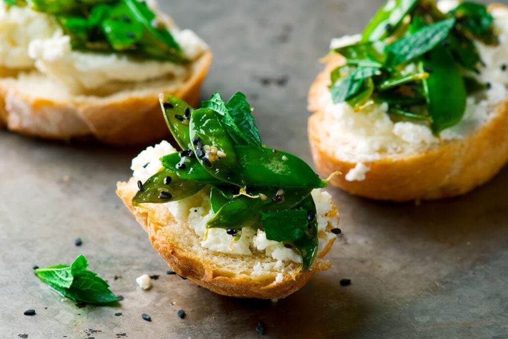 Whipped Ricotta Toast with Grilled Snap Peas