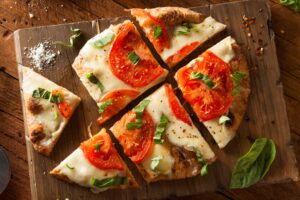 Homemade Margarita Flatbread Pizza with Tomato and Basil